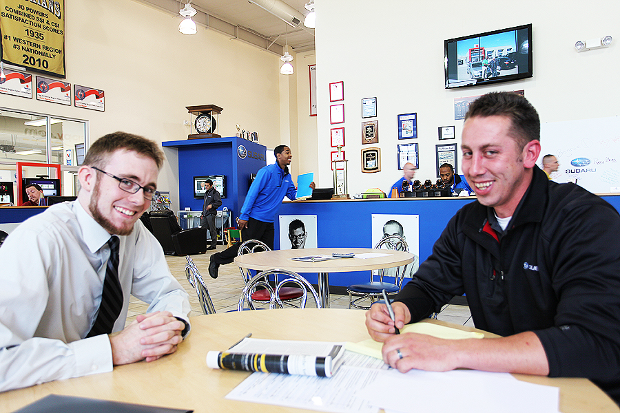 Alec (L) and Kasey, Filling Out New Hire Paperwork