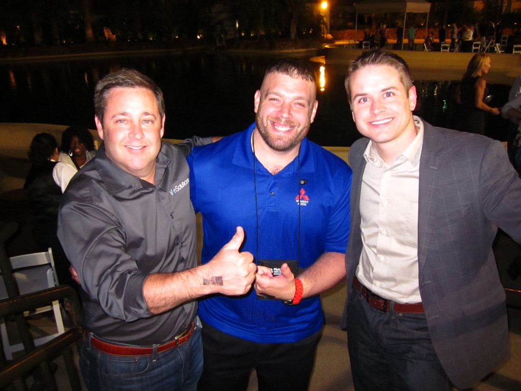 Sean Stapleton, Richard Herod, and Michael Groves at the VinSolutions after-hours party